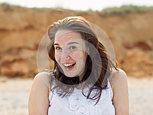 Brunette looking at camera smiling