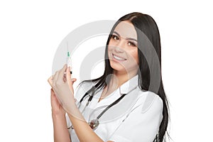 Brunette nurse holding syringe and preparing injection with vaccine.