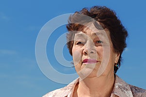 Brunette pensioner woman outdoor