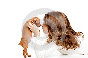 Brunette profile girl with dog puppy mini pinscher