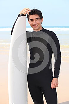 Brunette with surfboard
