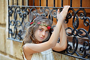 Brunette tourist kid girl in mediterranean old town