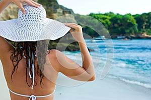 Brunette in white hat