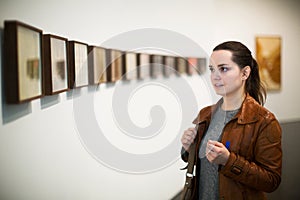 Brunette woman in art museum