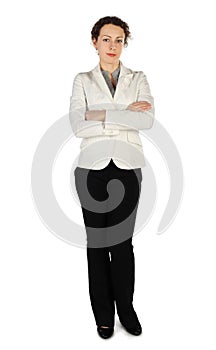 Brunette woman in business dress, standing