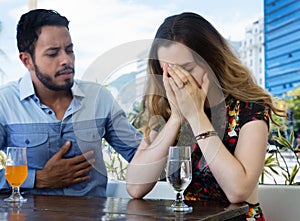 Brunette woman crying after relationship difficulties with husband