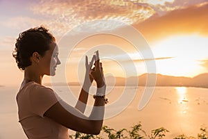 Brunette woman curly hair girl takes selfie photo