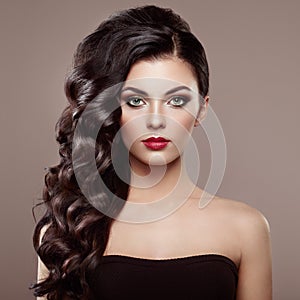 Brunette woman with curly hairstyle