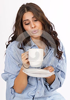 Brunette Woman Enjoys Morning Coffee