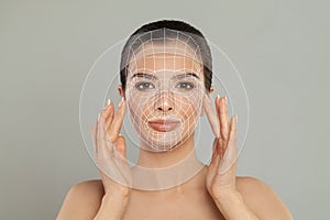 Brunette woman. Face lift anti-aging lines on young female face. Graphic lines showing facial lifting effect on skin.