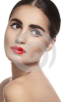 Brunette woman with glamour red lips make-up, clean skin