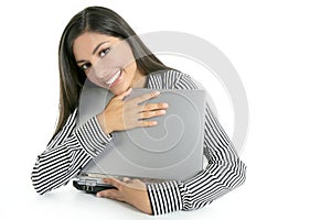 Brunette woman hug laptop computer