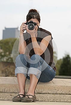 Brunette woman photographer