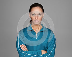 Brunette woman with slicked back hairstyle. Isolated