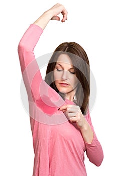 Woman sweating very badly under armpit photo