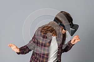 Brunette woman testing virtual reality helmet