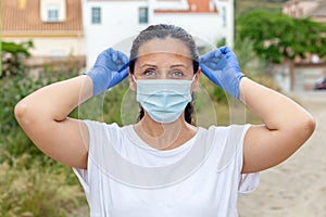 Brunette woman wearing a mask