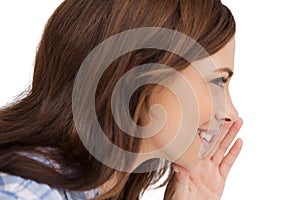 Brunette woman whispering a secret