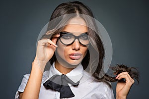 brunette young business woman wearing diopter glasses