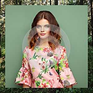 Brunette young woman in floral spring summer dress