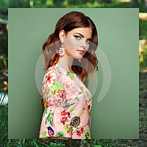 Brunette young woman in floral spring summer dress