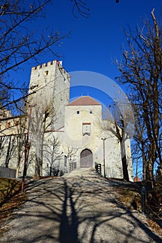 Brunico castle in winter time, sunny day, Bruneck in Puster Valley, South Tyrol, Italy. photo