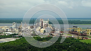 Brunswick cellulose and paper plant in Georgia, USA. Wood processing factory manufacturing yard. Toxic influence of