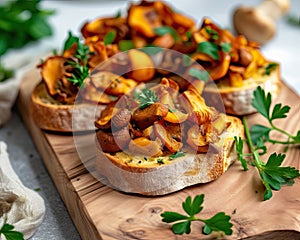 Bruschetta with chanterelle mushrooms on wooden board. Food and appetizers. Mediterranean cuisine.