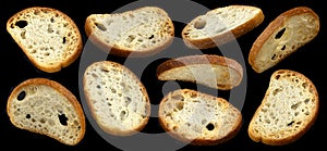 Bruschetta crackers, round bread croutons isolated on black background