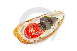 Bruschetta with cream cheese tomato and basil on white