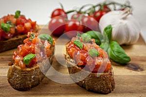 Bruschetta - sandwitch with tomatoes, basil and oliven oil