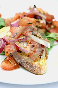 Bruschetta with sliced tomatoes