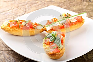 Bruschetta with tomato, garlic and olive oil