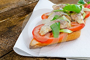 Bruschetta with tomato, sardines