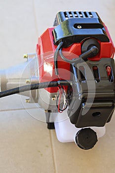 Brush cutter engine on the floor
