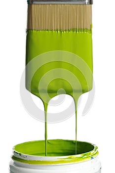 Brush with green paint dripping