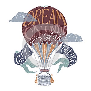 Brush lettering inspiration quote in a color vintage hot air balloon saying Dream on until you get there.