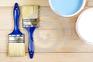 Brush and paint on wooden boards