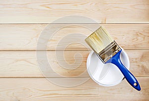 Brush and paint on wooden boards