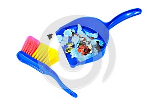 Brush and scoope with garbage isolated