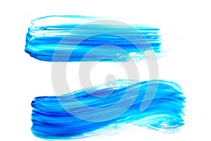 Brush strokes with blue oil paint on white isolated background.