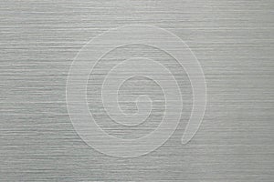 Brushed brushed aluminum surface. Empty abstract background of gray color