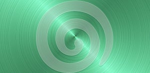 Brushed circular green metal surface. Texture of metal. Abstract steel panoramic background