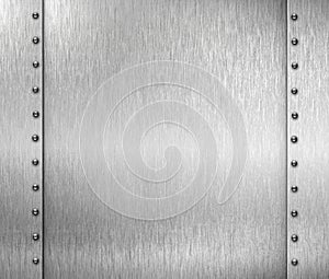 Brushed metal background with rivets