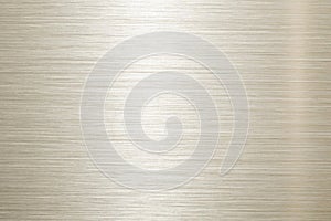 Brushed silver metal texture with horizontal lines and bright reflection