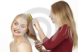 She brushes her girlfriend the hair - it cheeps