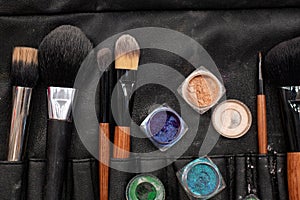 Brushes, palettes, blush, pigments, eye shadow, mascara.