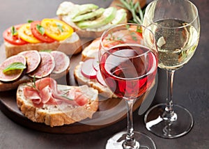 Brushetta or spanish tapas set with wine