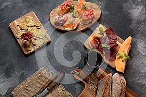 Brushetta or traditional Spanish tapas. Appetizers with Italian antipasti snacks.