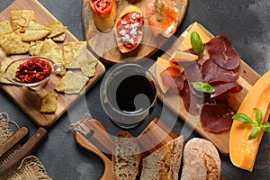 Brushetta or traditional Spanish tapas. Appetizers with Italian antipasti snacks.